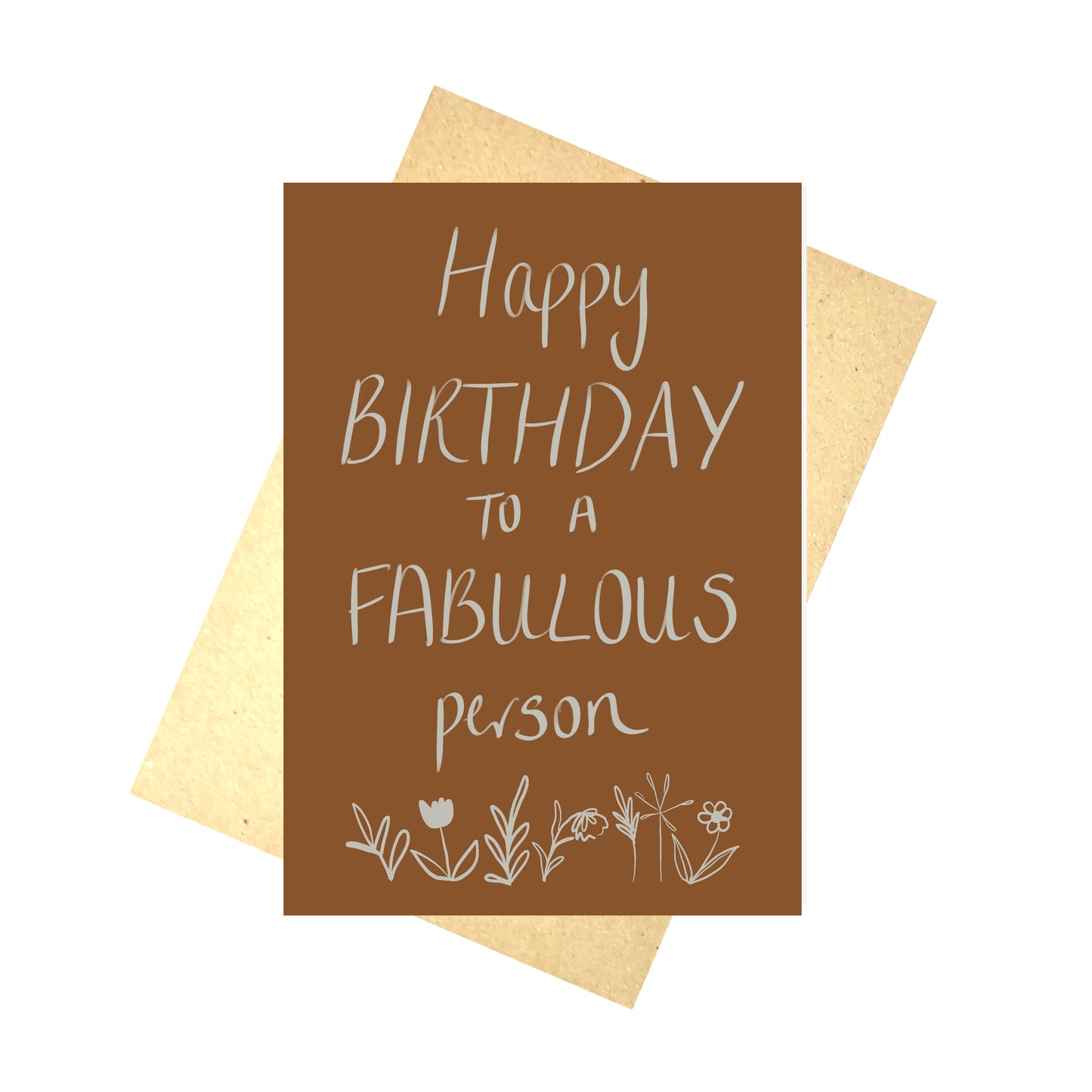 A dusky orange card with the words ‘Happy BIRTHDAY TO A FABULOUS person’ in an off white colour above some simple plant illustrations. Behind the card you can see a recycled brown paper envelope in front of a white background.