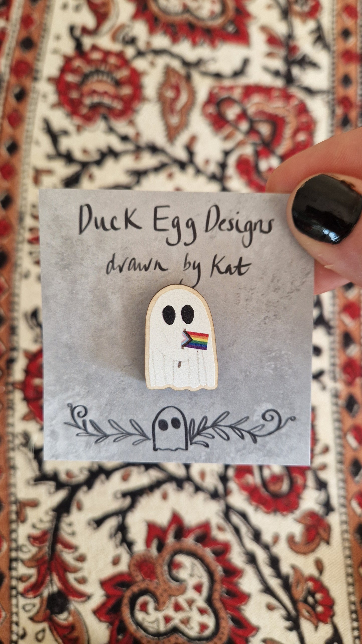 Ghost Holding Pride Flag Pin