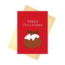 Load image into Gallery viewer, A red card featuring a simple christmas pudding illustration. Above the pudding are the words &#39;Happy Christmas&#39; in contrasting white. Behind the card is a brown envelope, behind which is a white background.
