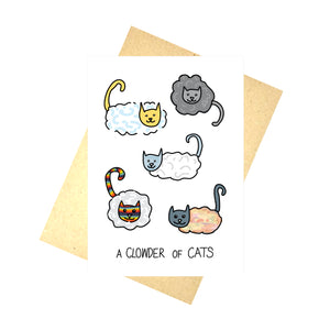 White card with cats that are part cloud with regular heads and tails with a cloud body. The cats are a variety of different colours inspired by the weather and the sky. At the bottom of the card are the words 'A CLOWDER OF CATS' in black handwriting. Behind the card is a brown envelope at an angle, behind which is a white background.