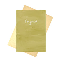 Load image into Gallery viewer, A tonal deep mustard yellow card sits in front of a recycled brown paper envelope in front of a white background. The card says &#39;Congrats!&#39; in white handwriting across the middle. 
