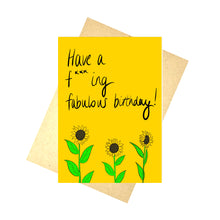 Load image into Gallery viewer, Warm yellow card with the words &#39;Have a f***ing fabulous birthday!&#39; in black handwriting above some sunflowers growing up from the bottom of the card. Behind the card you can see a brown envelope in front of a white background.
