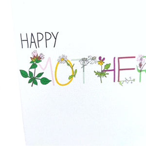 A close up of the card showing the detail in the floral lettering.