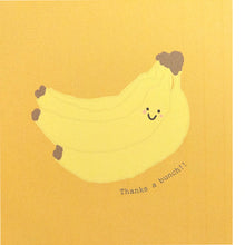 Load image into Gallery viewer, Close up of the cartoon banana and writing on the yellow orange background.
