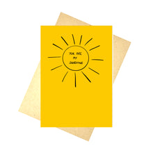 Load image into Gallery viewer, Warm yellow card featuring a simple sun shape in black. In the middle of the sun are the handwritten words &#39;YOU ARE MY SUNSHINE&#39; in black handwriting. Behind the card you can see a brown envelope, in front of a white background. 
